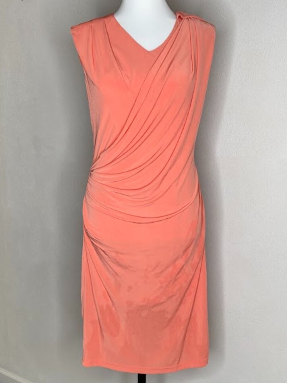 #58866 A form-fitting stretchy, coral-orange sleeveless dress